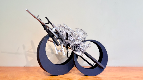 Contemporary freestyle Sogetsu arrangement by Louise Worner in metal